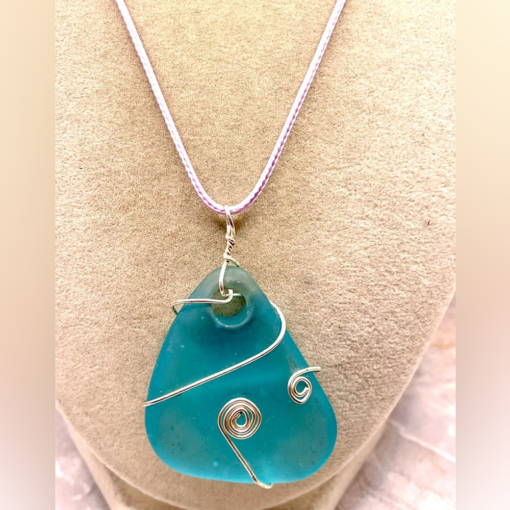 Hawaiian Blue Wire-Wrapped Sea Glass Pendant on a Purple Cord Necklace. 16 inch